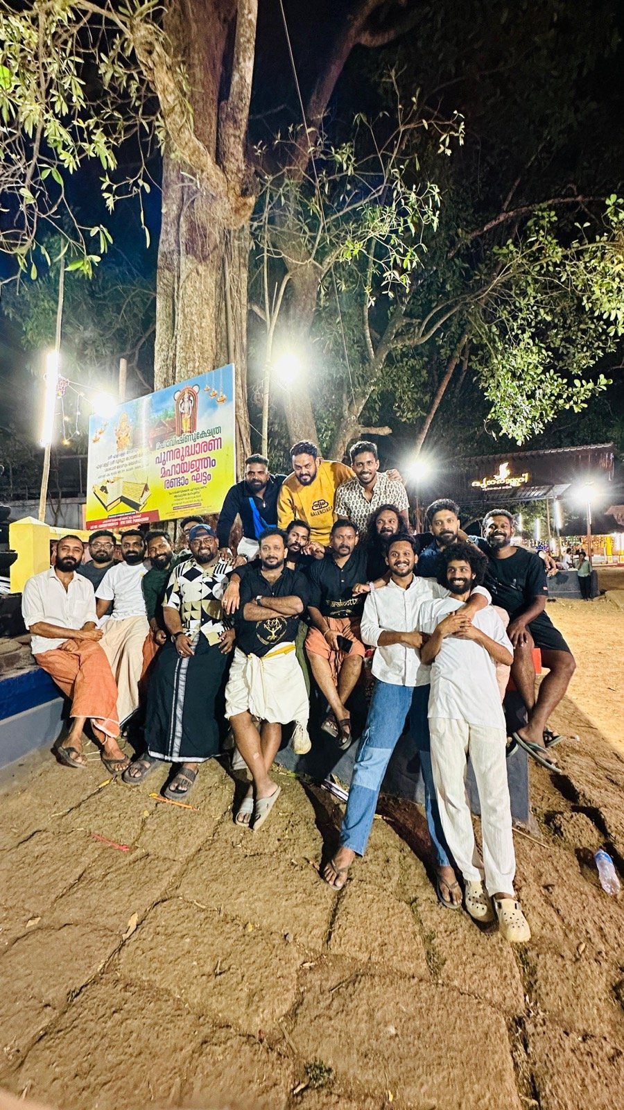Members of Ancharakootam together at the temple grounds in Elavally